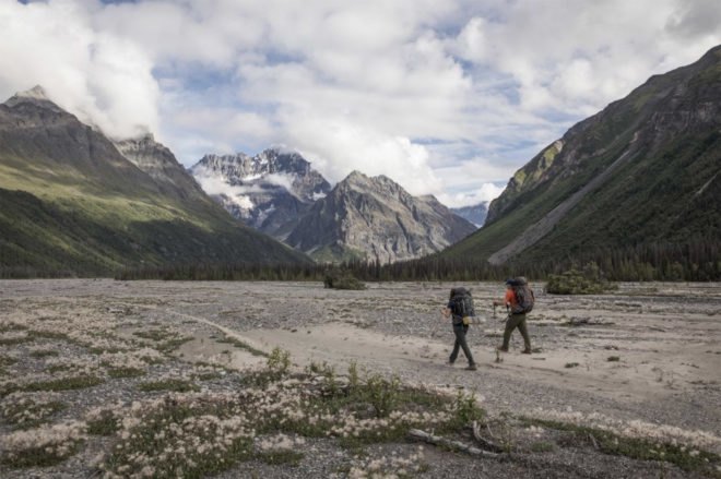 Two men walking in Alaska’s Wrangell-St. Elias National Park