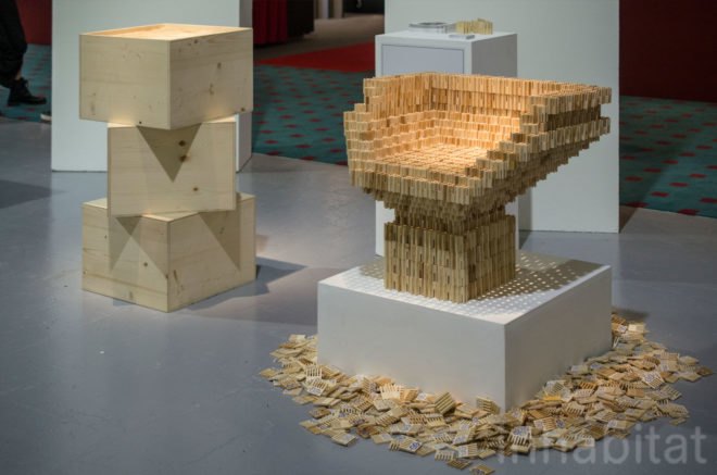 Plug It by Studio Oberhauser features a chair made from tiny wooden pieces shaped like combs.