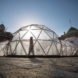 Visitor walking inside Pollution Pods by Michael Pinsky