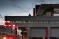 The building follows a black, red, and white color palette