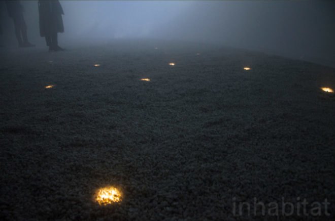 Spotlights shine through the floors of the dome.
