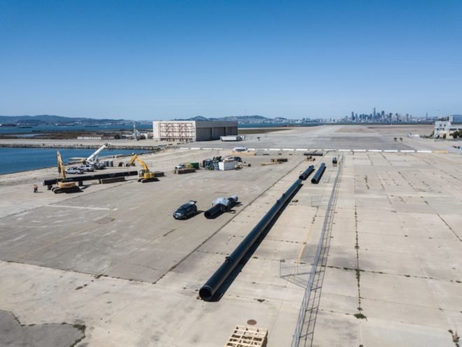 Assembly of The Ocean Cleanup's plastic-scooping system in Alameda, California