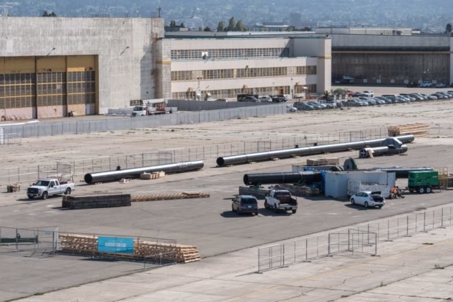 Assembly of The Ocean Cleanup's plastic-scooping system in Alameda, California