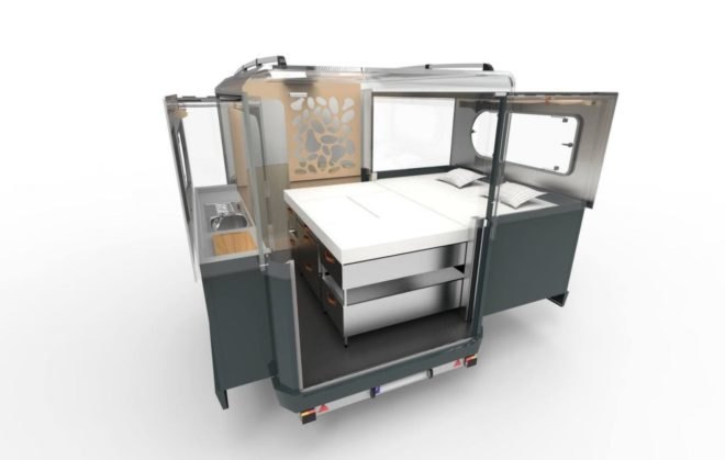 The travel pod set up as a king-size bed.