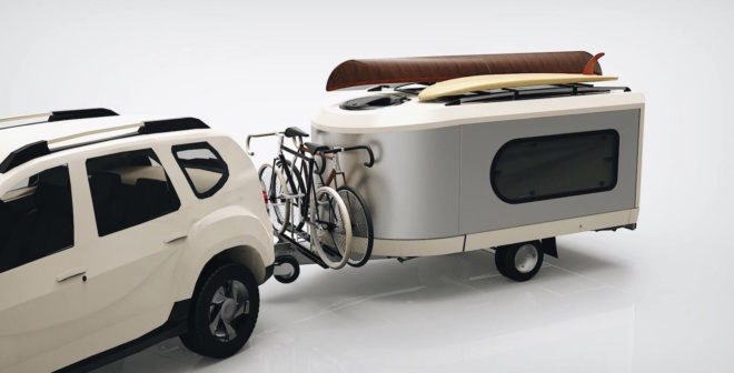 The trailer carrying bicycles and a kayak.