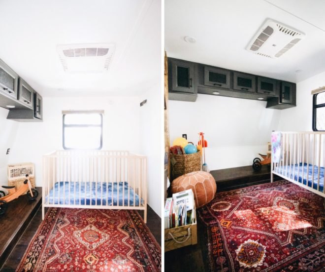 nursery with a crib and persian rugs on the floor