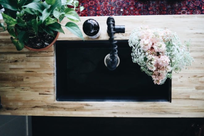 Overhead view of a black granite sink