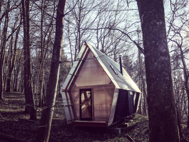 Trailer by Invisible Studio, Invisible Studio same section milling, low cost timber cabin, low cost self build project, plywood interior and polycarbonate cladding, reclaimed materials in self build project, Invisible Studio design build