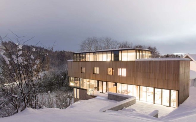 Night time view Two-in-One House by Reiulf Ramstad Arkitekter