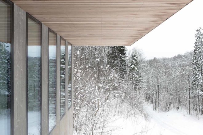 Cantilevered upper level Two-in-One House by Reiulf Ramstad Arkitekter