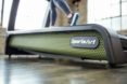 Close-up image of the SportsArt logo on a treadmill.