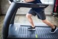 Man running on a treadmill.