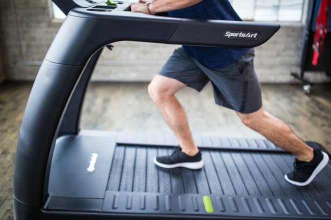Man running on a treadmill.