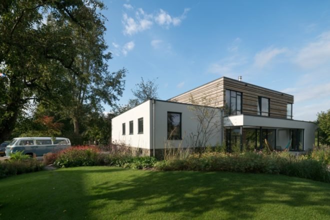 Exterior of the energy-neutral home is modern with plenty of greenery.