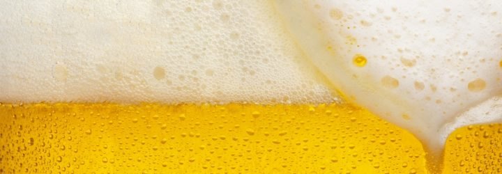 Close-up image of beer bubbles.