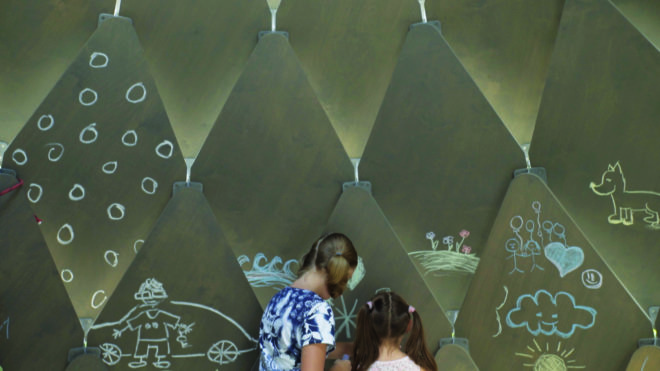 kids drawing on the gazebo