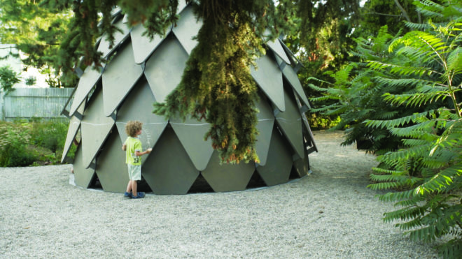 child playing outside the gazebo