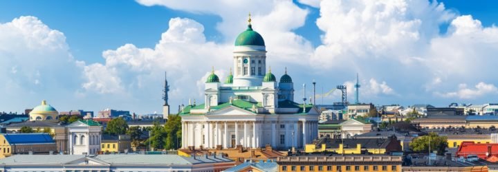 A summertime scene of Helsinki, with the Helsinki Cathedral featured prominently.