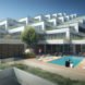 green tiered building with pool