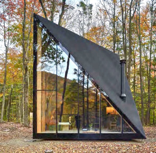 The glazed, triangular window of a tiny home