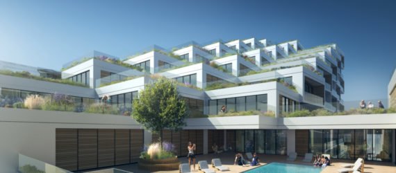 green tiered building with pool