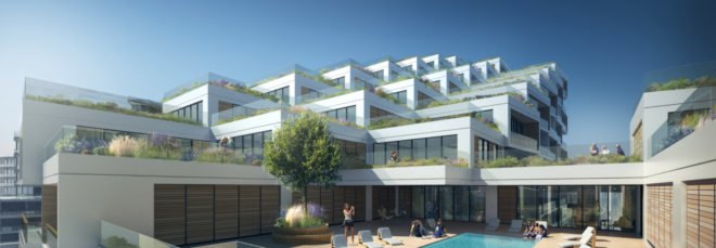 green tiered building with pool