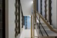 A white stairway and white walls