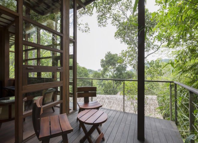 Outdoor terrace with table and chairs and views of the environment