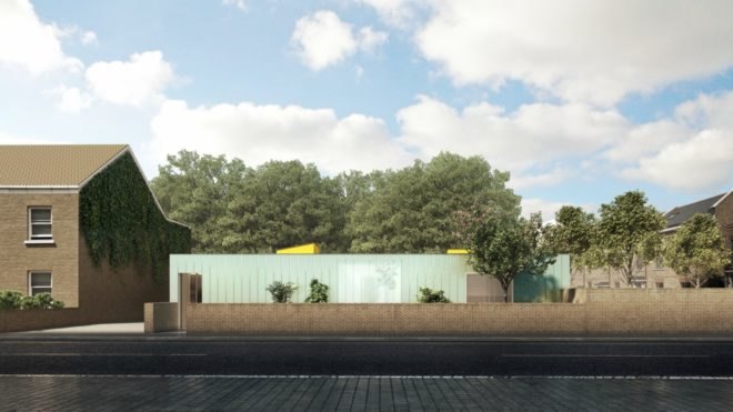 An extended bungalow with a transparent exterior and yellow skylights