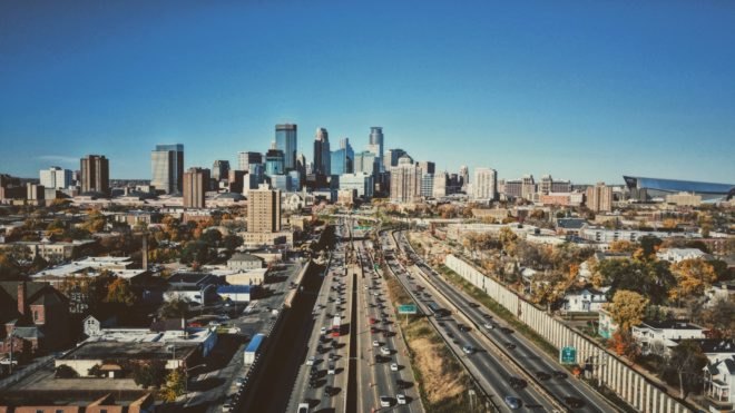Cars travel to and from the city of Minneapolis in Minnesota