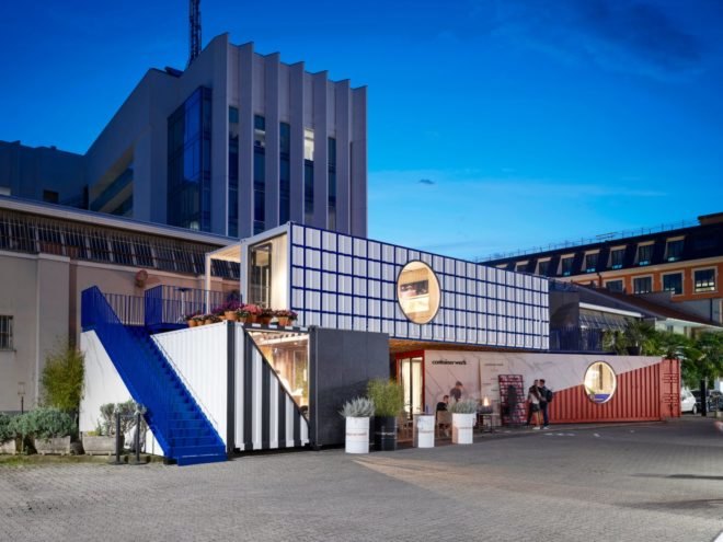 Three colorful shipping containers