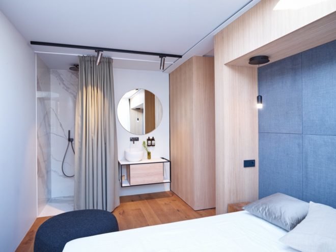 bedroom with adjacent bathroom