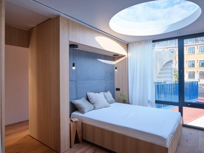 large bed with window in the background
