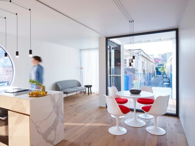 light-filled interior space with dining area
