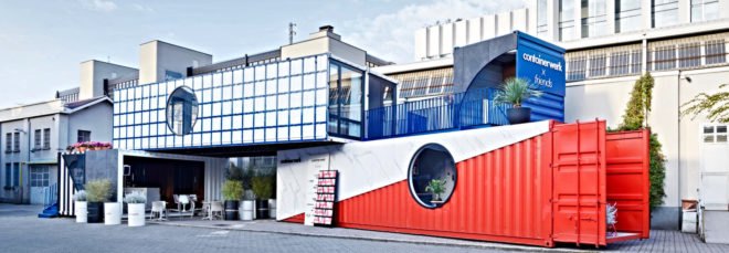 shipping container structure with blue and red accents