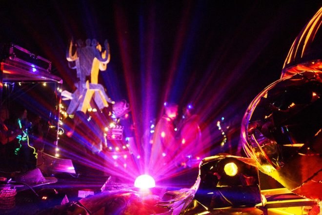 A pink orb illuminated a metal dung beetle sculpture