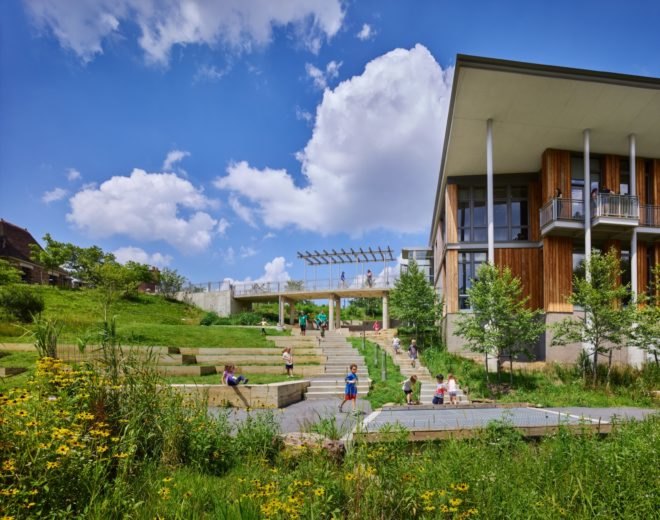 Outdoor space features grass, steps and walkways