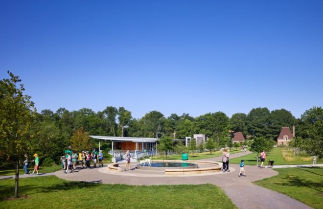 Outdoor space with benches and a water feature