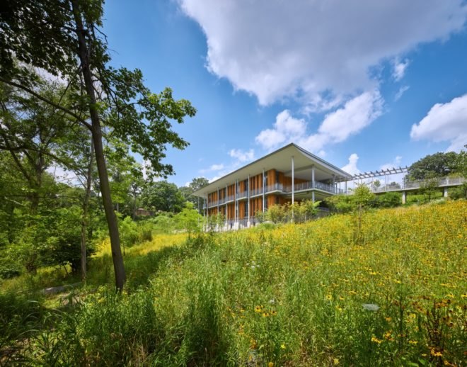 Building surrounded by grass and trees