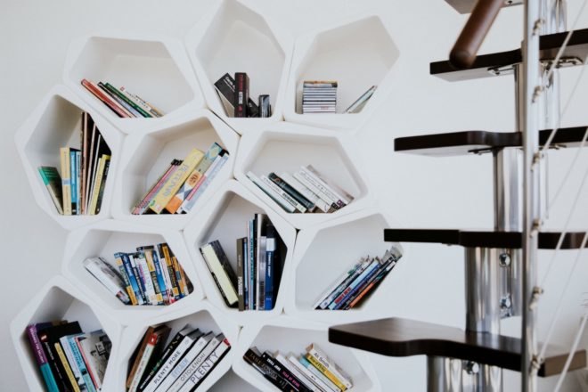 Geometric bookshelf filled with books