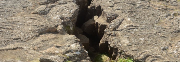A close-up of a large fissure opening in the Earth