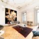 a living space with hardwood floors and furniture