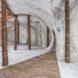 Wooden pillars supporting a curved ceiling