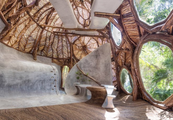 Curving spaces and wooden branch decoration inside a museum