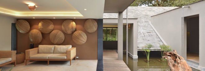 Room with a couch open to the outdoors