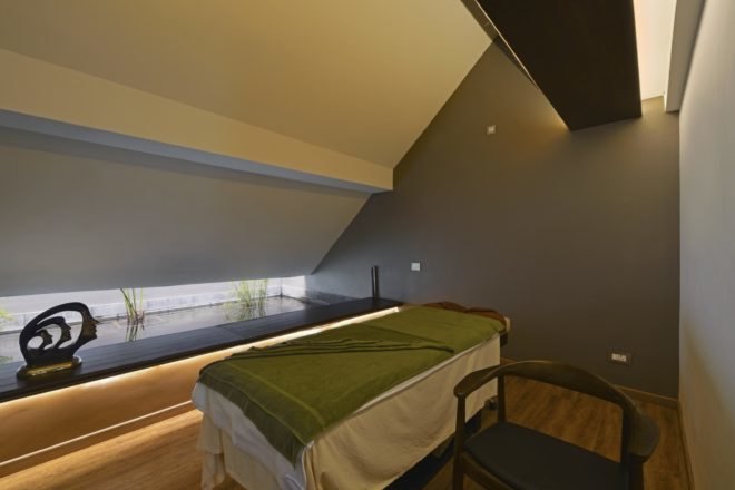 Interior of a massage room with a massage table