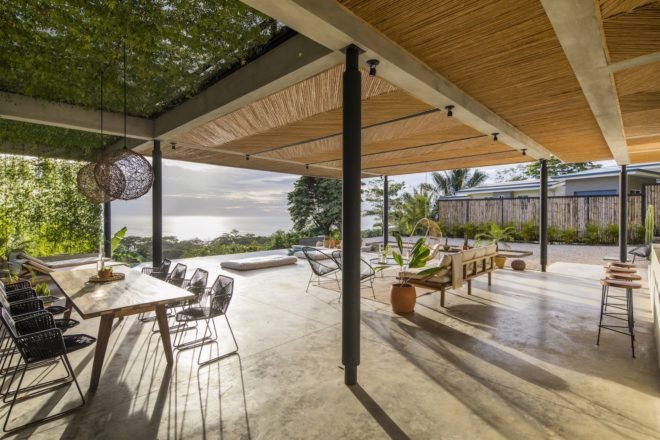 A communal space with modernist tables and chairs.