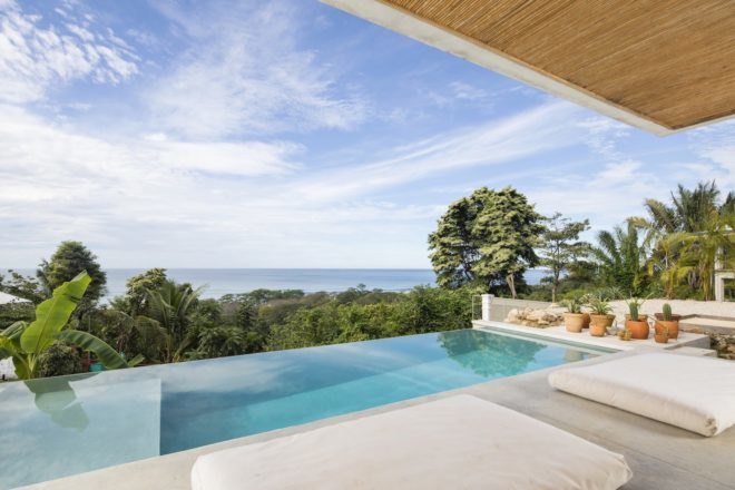 An infinity pool with a view of the ocean.