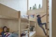 Plywood bunkbeds Mylla Cabin by Mork-Ulnes Architects