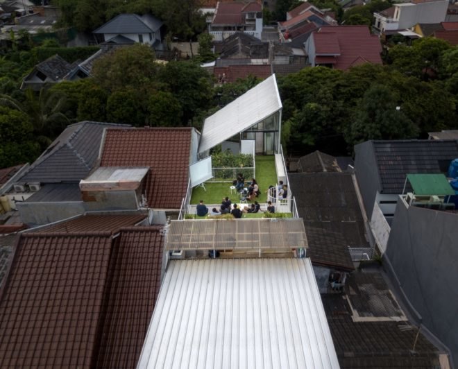 Birds eye view of people gathered on the green roof